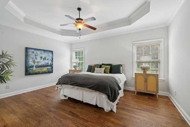 336 Alfred Ladd Rd E, Franklin, TN 37064 - bedroom featuring a tray ceiling, ornamental molding, wood finished floors, ceiling fan, and baseboards
