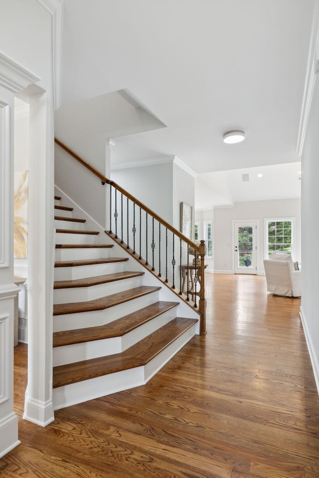 336 Alfred Ladd Rd E, Franklin, TN 37064 - stairway with crown molding, wood finished floors, and baseboards
