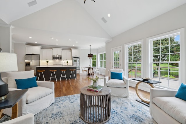 336 Alfred Ladd Rd E, Franklin, TN 37064 - living area with light wood-style floors, recessed lighting, and high vaulted ceiling