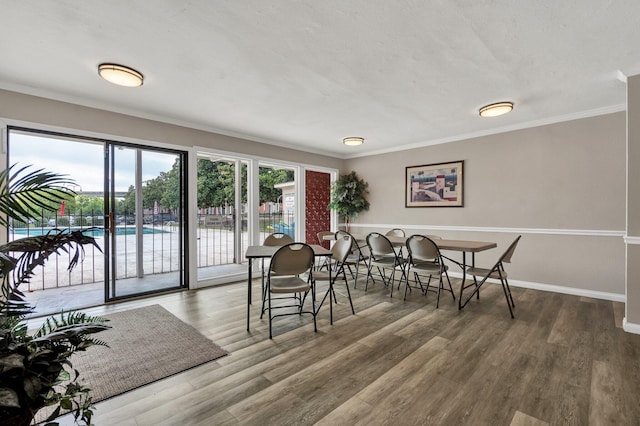 536 River St Unit 536, Chattanooga, TN 37405 - dining area featuring crown molding, wood finished floors, and baseboards