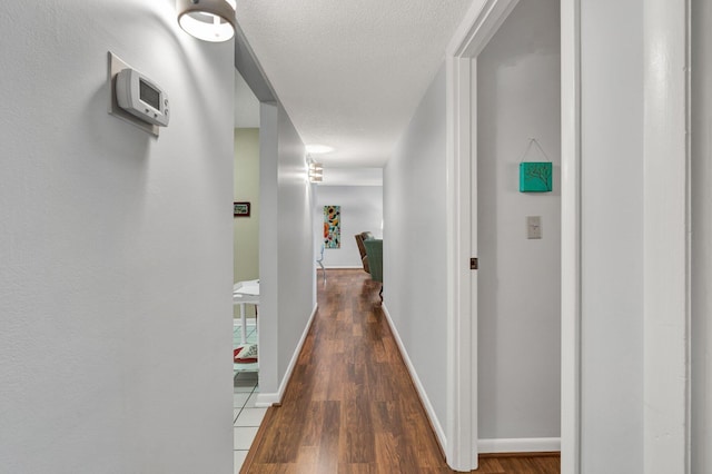 536 River St Unit 536, Chattanooga, TN 37405 - hallway featuring wood finished floors, baseboards, and a textured ceiling