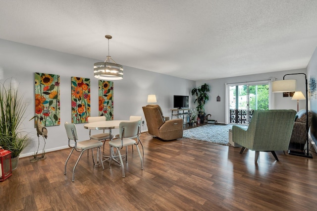 536 River St Unit 536, Chattanooga, TN 37405 - dining area with wood finished floors, a textured ceiling, a chandelier, and baseboards