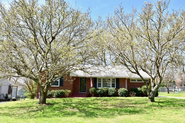 ranch-style house with brick siding
