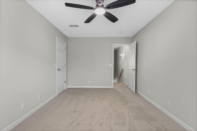 608 Flintlock Ct, Nashville, TN 37217 - unfurnished bedroom featuring light carpet, baseboards, and a ceiling fan