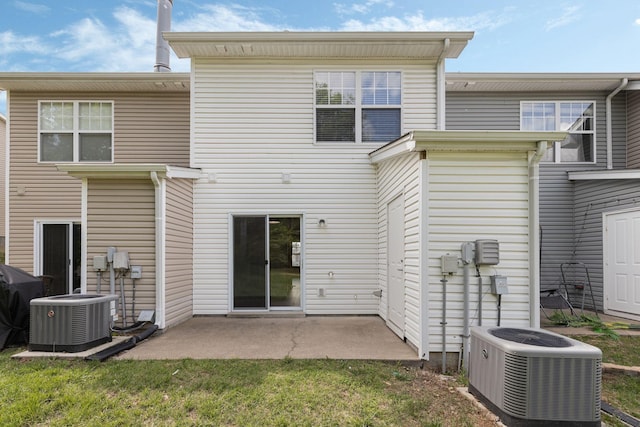608 Flintlock Ct, Nashville, TN 37217 - rear view of property with cooling unit and a patio