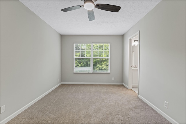 608 Flintlock Ct, Nashville, TN 37217 - carpeted spare room featuring a textured ceiling, a ceiling fan, and baseboards