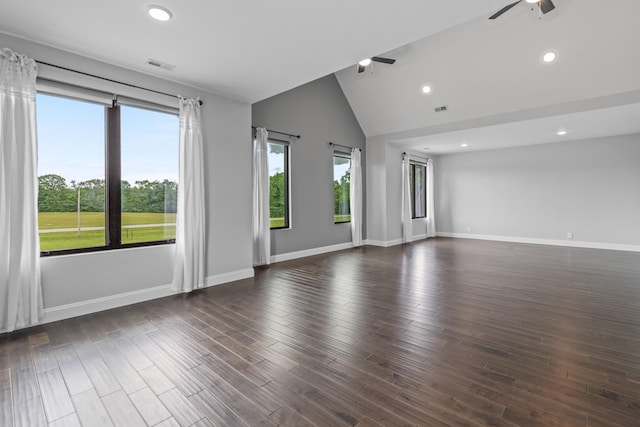 unfurnished living room featuring ceiling fan, recessed lighting, vaulted ceiling, baseboards, and dark wood-style flooring