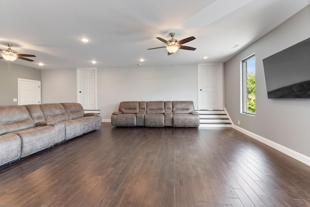 living room featuring ceiling fan, baseboards, dark wood finished floors, and recessed lighting