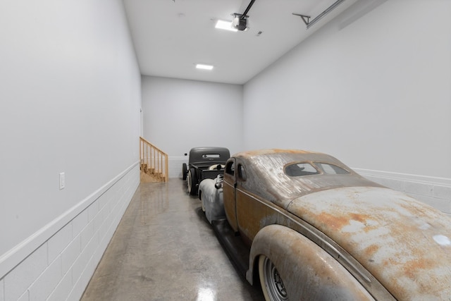 garage featuring a garage door opener