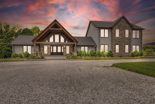 view of front of home featuring stone siding