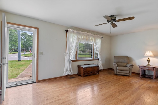 461 Annex Ave, Nashville, TN 37209 - sitting room featuring light wood-style flooring, a ceiling fan, and baseboards