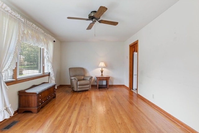 461 Annex Ave, Nashville, TN 37209 - sitting room with light wood-style flooring, ceiling fan, and baseboards