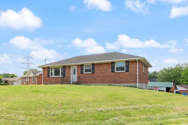 461 Annex Ave, Nashville, TN 37209 - single story home featuring brick siding, a front lawn, and roof with shingles