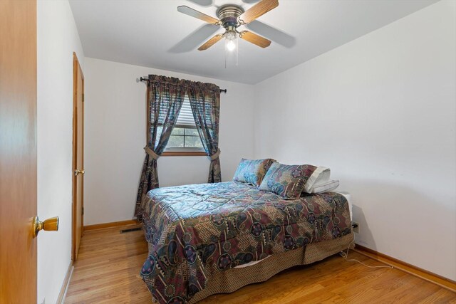 461 Annex Ave, Nashville, TN 37209 - bedroom with light wood finished floors, baseboards, and ceiling fan