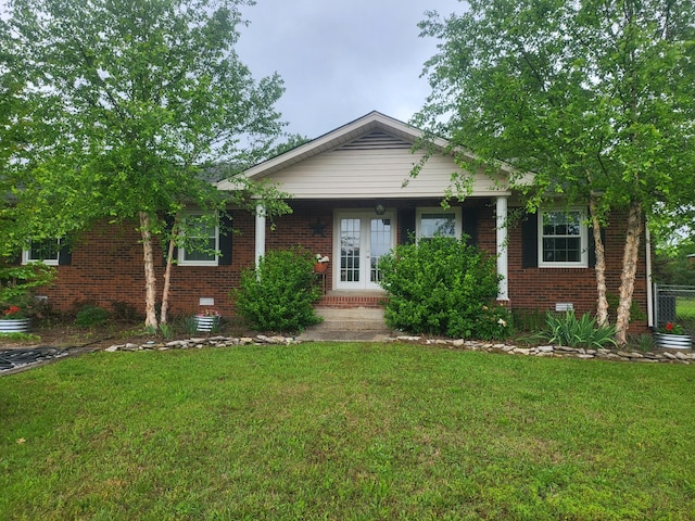 1120 Weeks Rd, Murfreesboro, TN 37127 - view of front facade featuring brick siding, a front yard, and crawl space