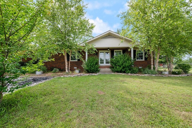 1120 Weeks Rd, Murfreesboro, TN 37127 - view of front facade featuring brick siding, a front lawn, french doors, a porch, and crawl space