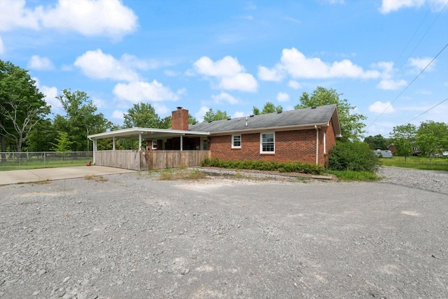 1120 Weeks Rd, Murfreesboro, TN 37127 - ranch-style house with concrete driveway, brick siding, and a chimney