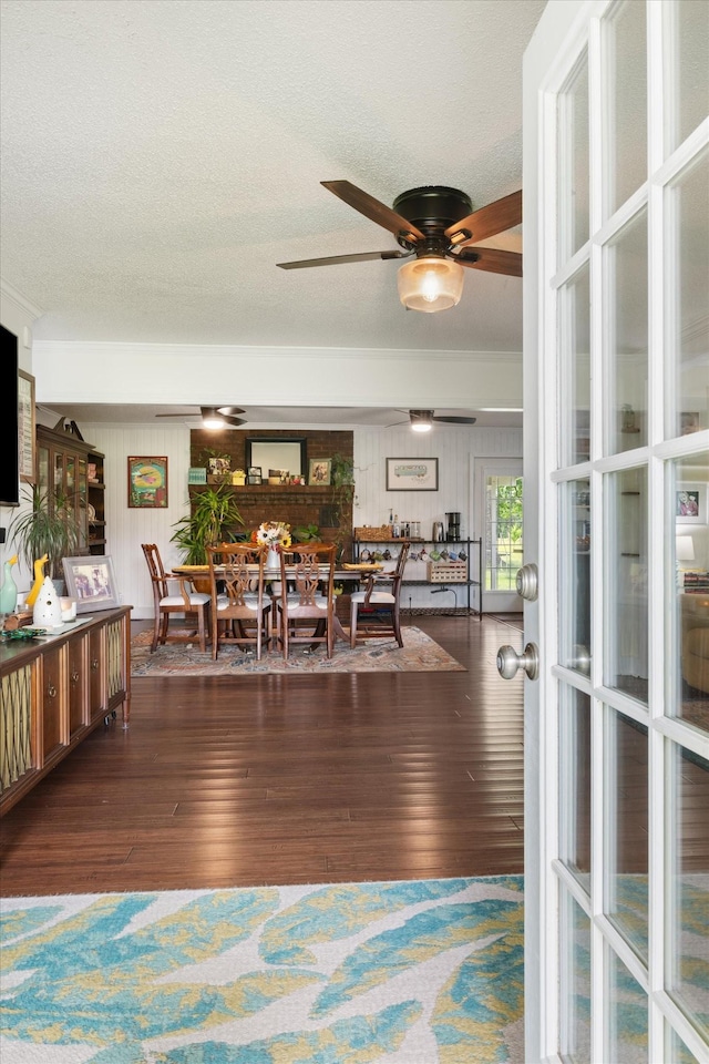1120 Weeks Rd, Murfreesboro, TN 37127 - dining space with a textured ceiling, wood finished floors, and ceiling fan