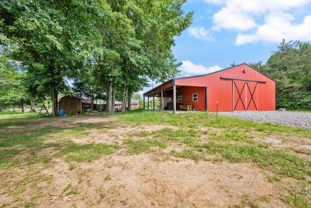 1120 Weeks Rd, Murfreesboro, TN 37127 - view of yard with a pole building, an outbuilding, and a garage