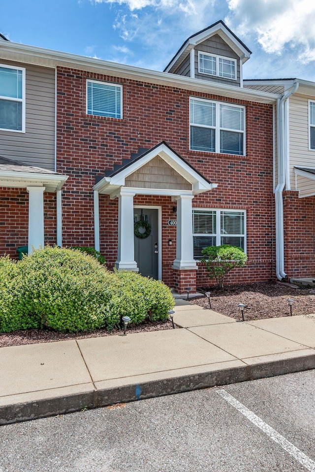 multi unit property featuring brick siding
