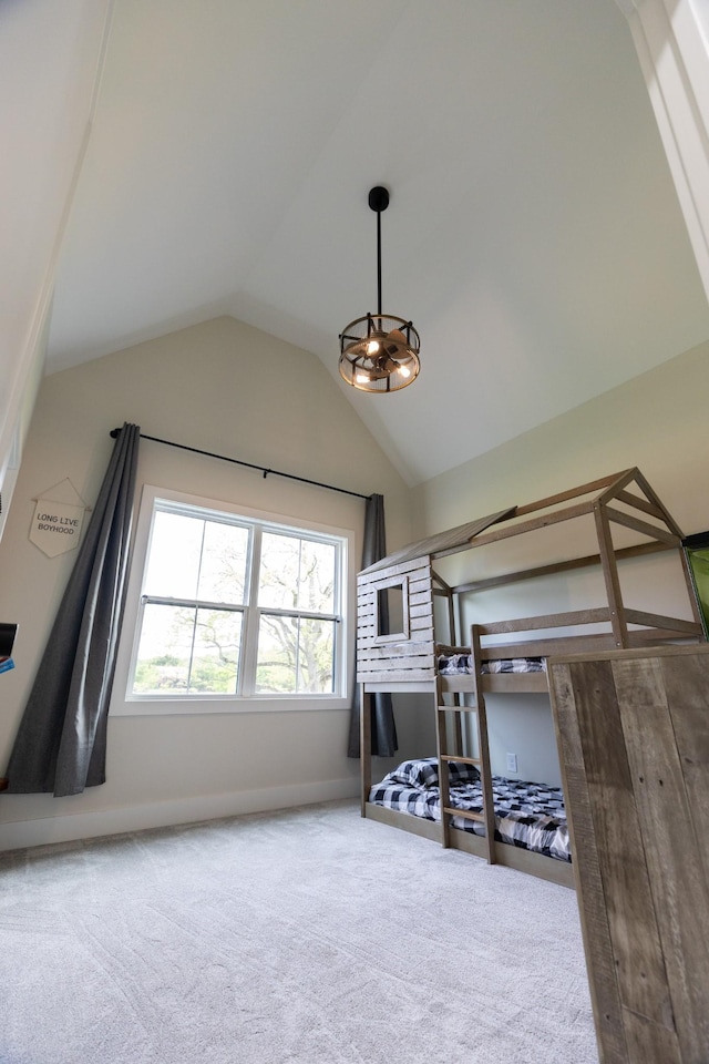 1325 Rogers Ln, Lebanon, TN 37087 - unfurnished bedroom with carpet flooring, lofted ceiling, and baseboards