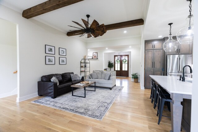 1325 Rogers Ln, Lebanon, TN 37087 - living area with beam ceiling, ceiling fan, light wood finished floors, baseboards, and recessed lighting