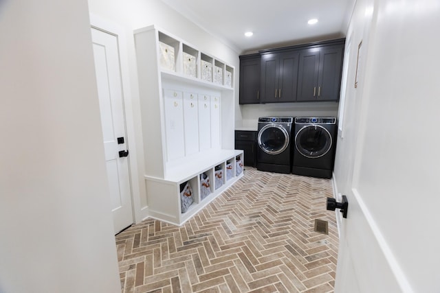 1325 Rogers Ln, Lebanon, TN 37087 - laundry room with washer and clothes dryer, brick floors, and cabinet space