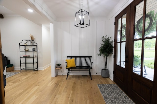 1325 Rogers Ln, Lebanon, TN 37087 - interior space featuring plenty of natural light, wood finished floors, a decorative wall, a chandelier, and baseboards