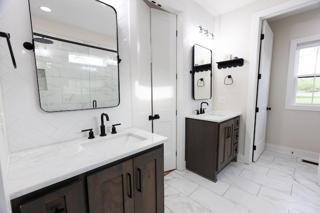 1325 Rogers Ln, Lebanon, TN 37087 - bathroom featuring a stall shower, two vanities, marble finish floors, and baseboards