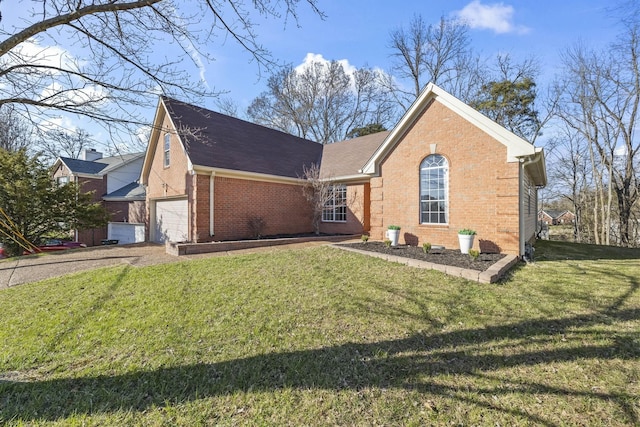 view of front of home with brick siding, driveway, a garage, and a front yard