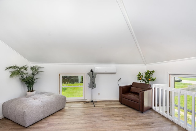 112 Churchill Pl, Franklin, TN 37067 - living area featuring a wall mounted air conditioner, lofted ceiling, healthy amount of natural light, wood finished floors, and crown molding
