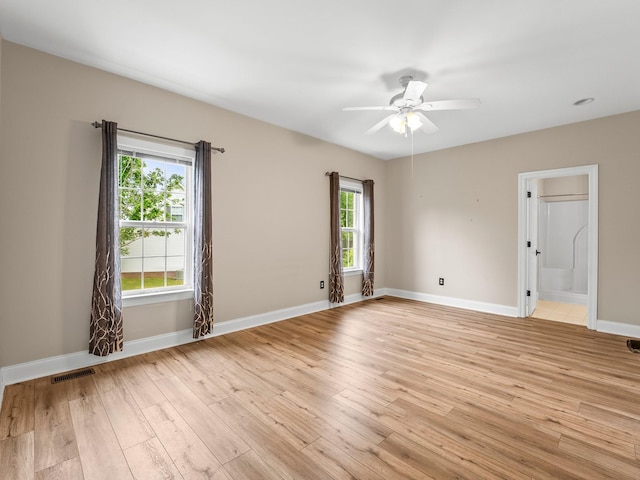 416 Overlook Cir, Tullahoma, TN 37388 - spare room with a ceiling fan, light wood-style flooring, and baseboards