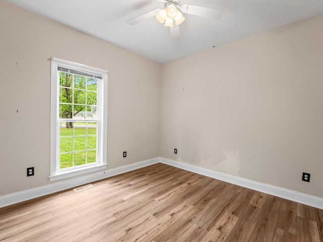 416 Overlook Cir, Tullahoma, TN 37388 - unfurnished room featuring light wood-style floors, baseboards, and ceiling fan