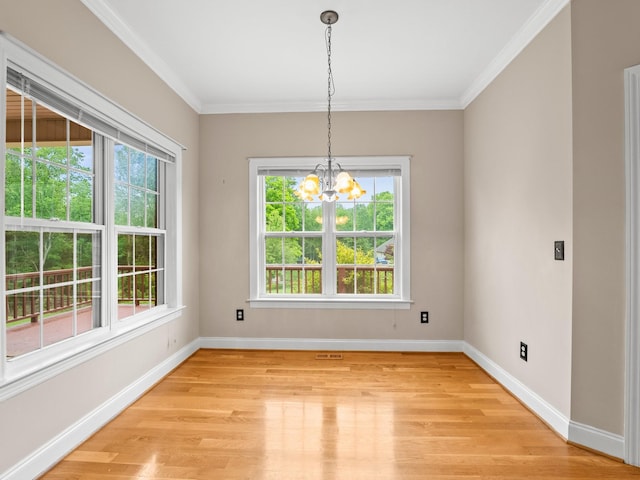 416 Overlook Cir, Tullahoma, TN 37388 - unfurnished dining area featuring baseboards, a chandelier, light wood-style floors, and crown molding