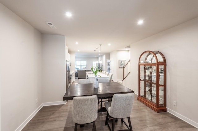 124 Great Falls Ct, Gallatin, TN 37066 - dining room with wood finished floors, stairs, recessed lighting, and baseboards