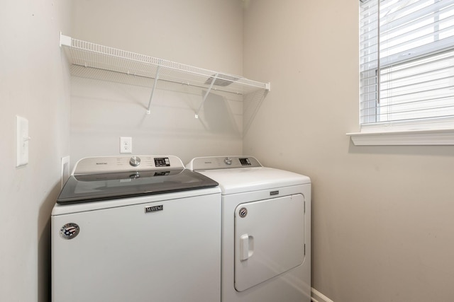 laundry area featuring independent washer and dryer