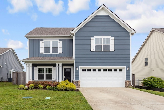 view of front of home featuring board and batten siding, central AC unit, concrete driveway, a garage, and stone siding