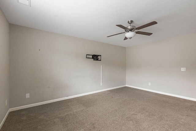 unfurnished room featuring ceiling fan, baseboards, and carpet