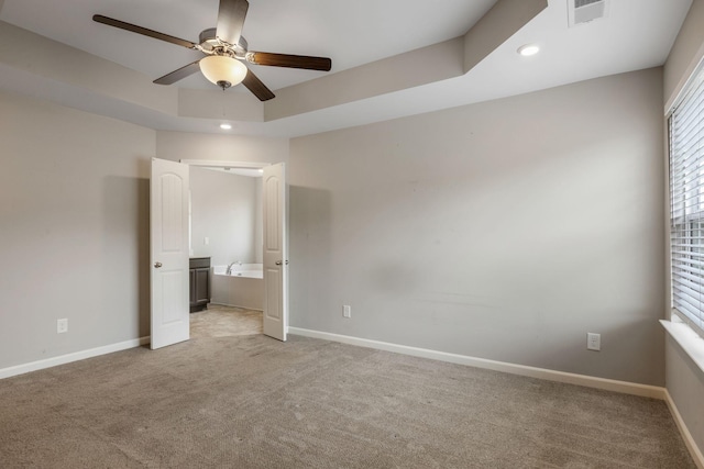 unfurnished bedroom featuring light carpet, baseboards, recessed lighting, and ceiling fan