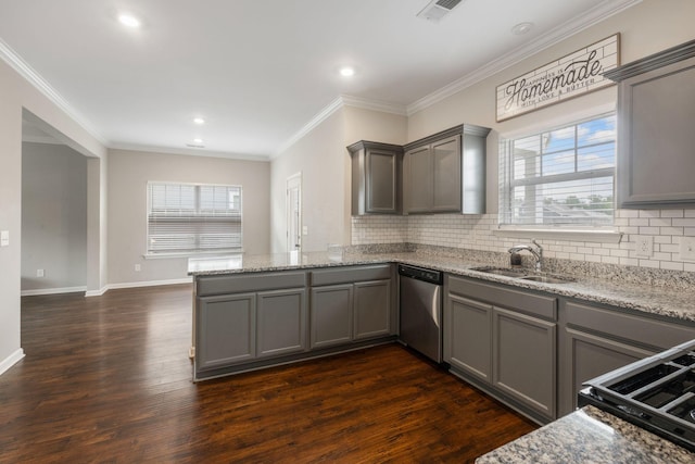 kitchen featuring gray cabinets, dishwasher, a sink, a peninsula, and decorative backsplash