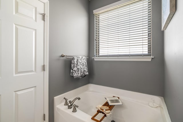 bathroom featuring a garden tub