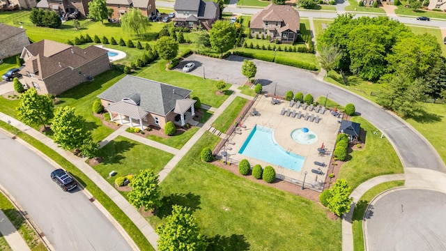 aerial view of residential area featuring a pool