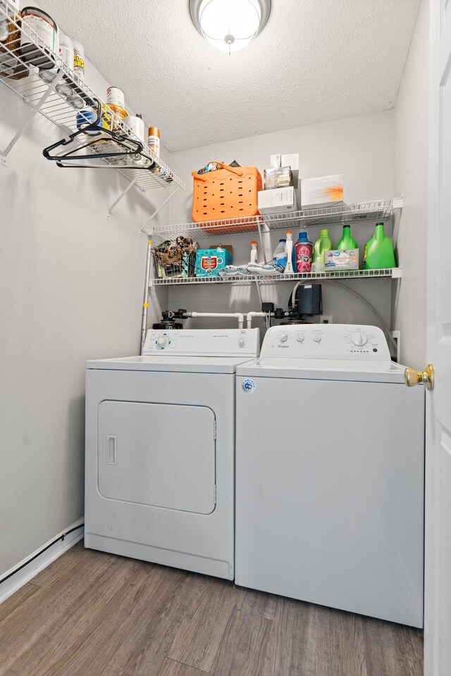 158 Cornerstone Blvd, Portland, TN 37148 - clothes washing area with independent washer and dryer, wood finished floors, and a textured ceiling