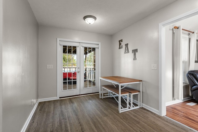 158 Cornerstone Blvd, Portland, TN 37148 - doorway to outside featuring french doors, wood finished floors, and baseboards
