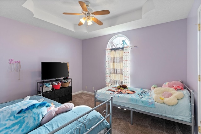 158 Cornerstone Blvd, Portland, TN 37148 - bedroom with carpet floors, a ceiling fan, baseboards, and a raised ceiling