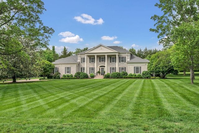 view of front of property with a front lawn