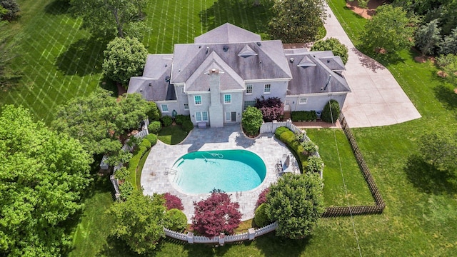 view from above of property featuring a pool area