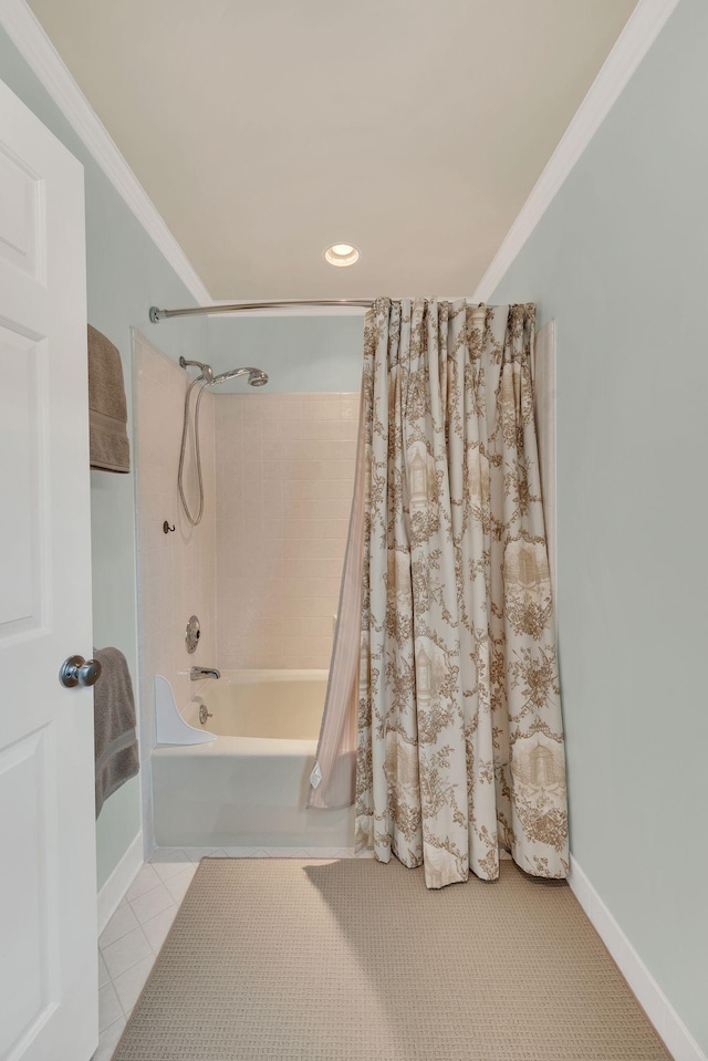 bathroom with shower / tub combo, ornamental molding, tile patterned floors, and baseboards