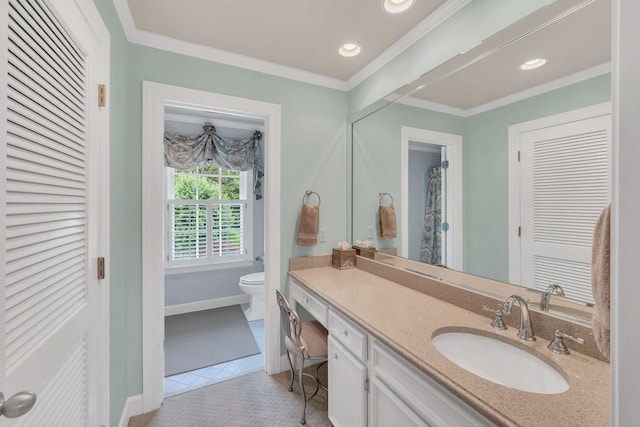 full bath with toilet, vanity, baseboards, crown molding, and tile patterned flooring