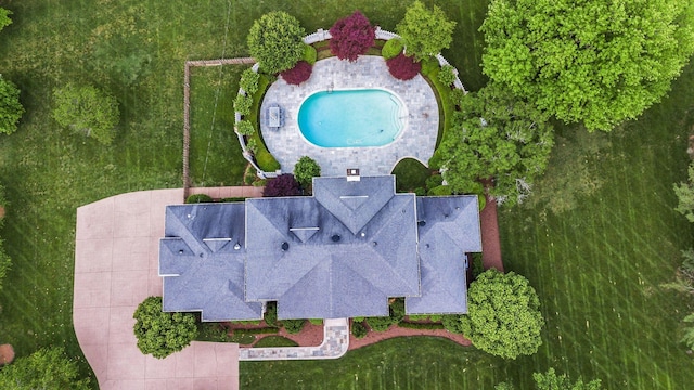 view of subject property featuring a pool